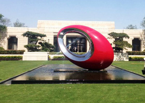 Un buon prezzo. Sculture moderne di arte del giardino della grande sfera all'aperto ovale della scultura del metallo dipinte rosso in linea