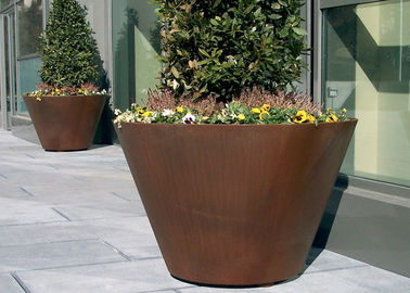 Un buon prezzo. Varie dimensioni/colori della piantatrice rotonda d'acciaio tradizionale grande di Corten disponibili in linea
