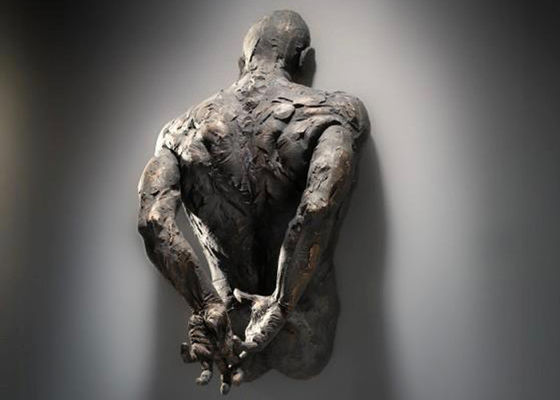 Un buon prezzo. uomo di altezza di 120cm sulla scultura bronzea della parete per la decorazione dell'interno in linea